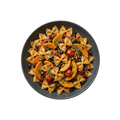 Farfalle mit Kürbissugo, Tomaten und karamelisierten Kernen
